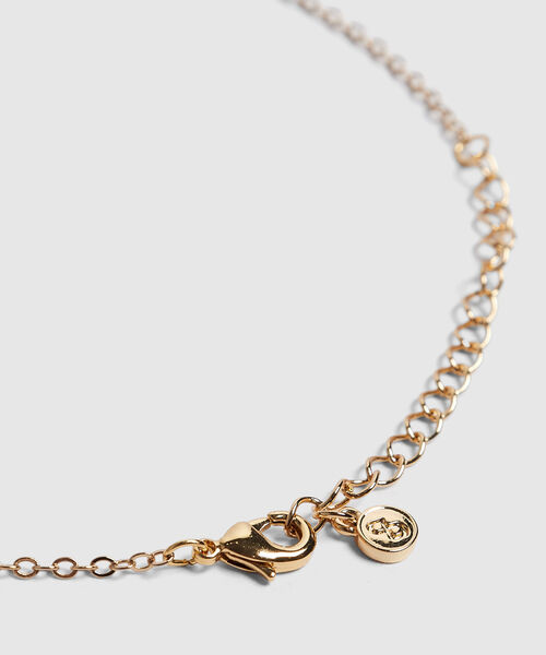 Set de accesorios dorados con perlas