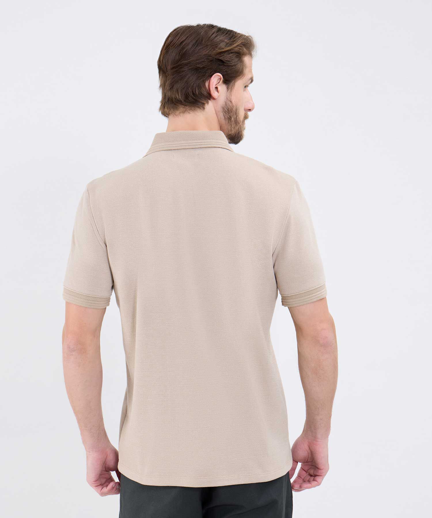 Polo Unicolor Con Detalle En Manga