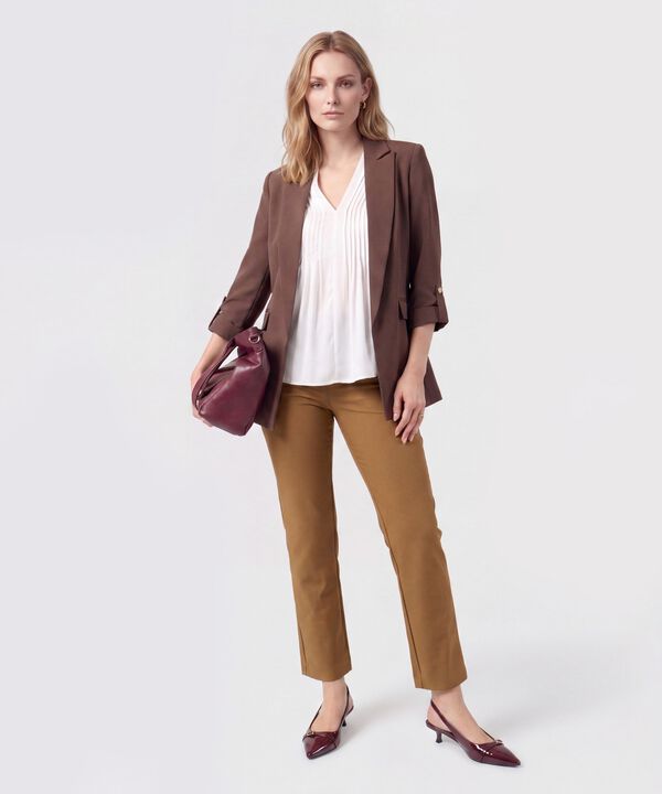 Blusa Con Alforjas Y Escote En V Mujer