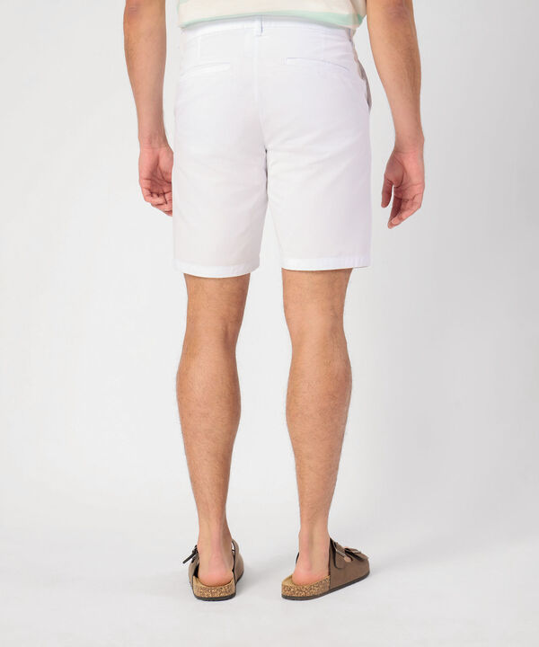 Bermuda Unicolor Con Bolsillos Diagonales 