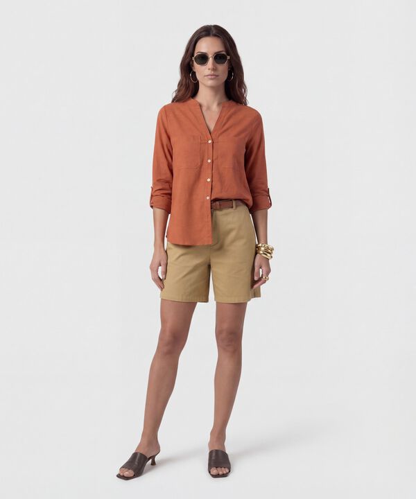 Blusa Fluida Con Bolsillos Frontales
