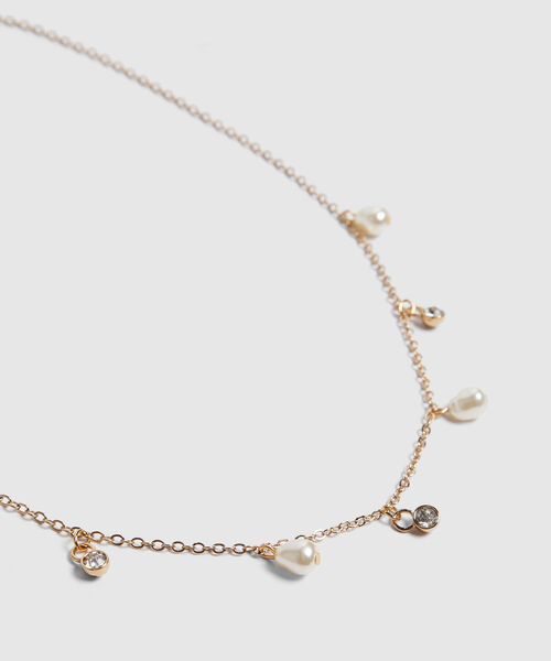 Set de accesorios dorados con perlas image number null