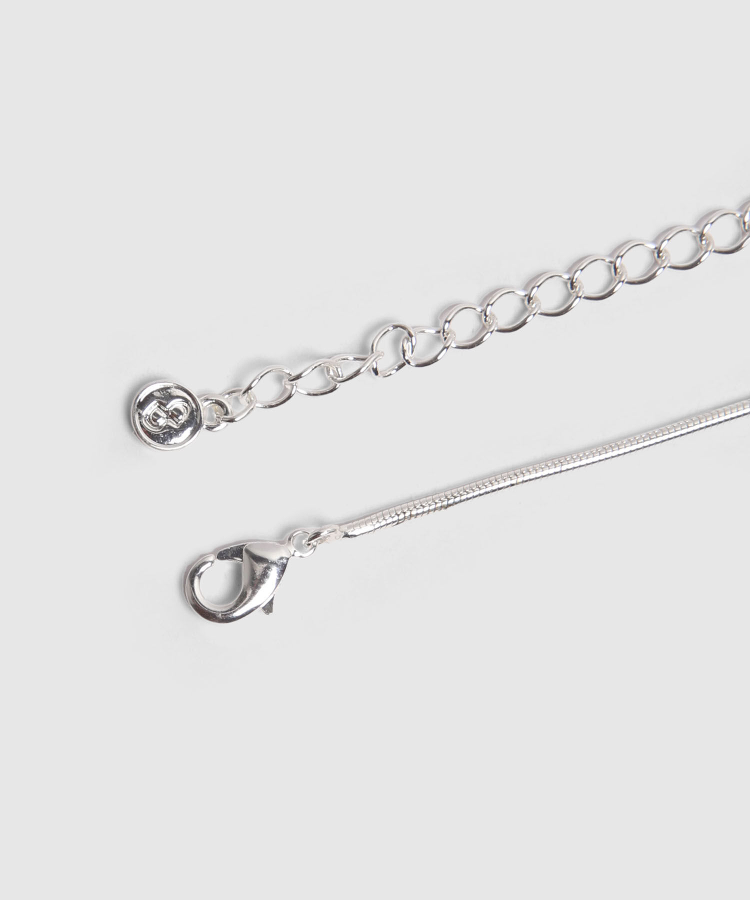 Collar Plateado Con Dije De Aros Bicolor 